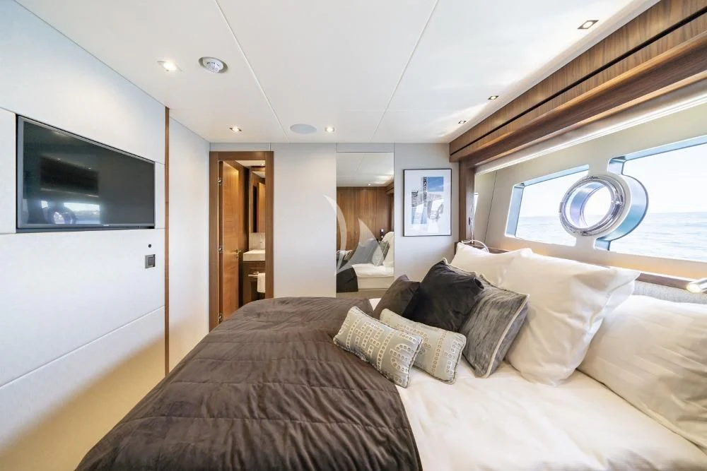 a bed with a large bed aboard TAKE OFF Yacht for Sale