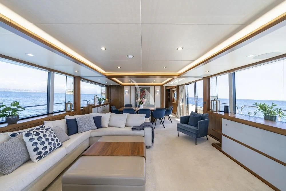 a modern looking living room aboard TAKE OFF Yacht for Sale