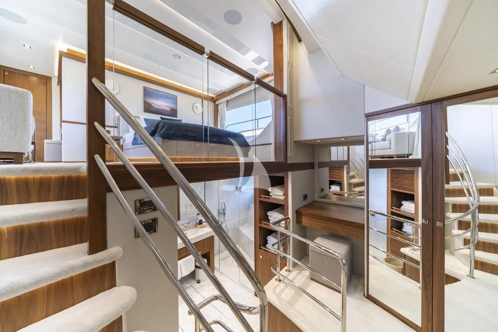 a room with a bunk bed and a desk aboard TAKE OFF Yacht for Sale