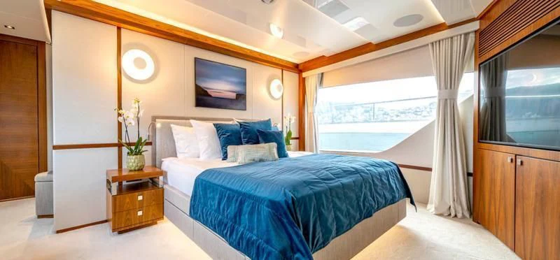 a bed in a room aboard TAKE OFF Yacht for Sale