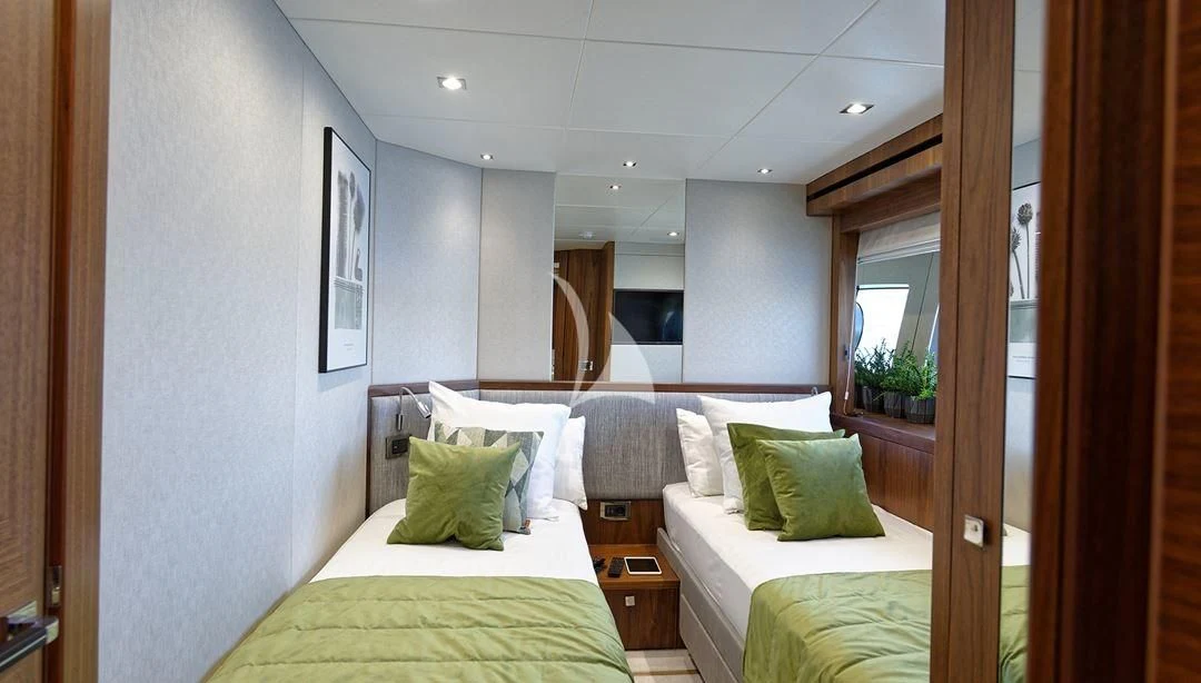 a room with two beds aboard TAKE OFF Yacht for Sale