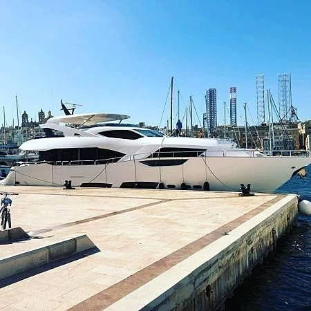 a yacht docked at a dock aboard TAKE OFF Yacht for Sale