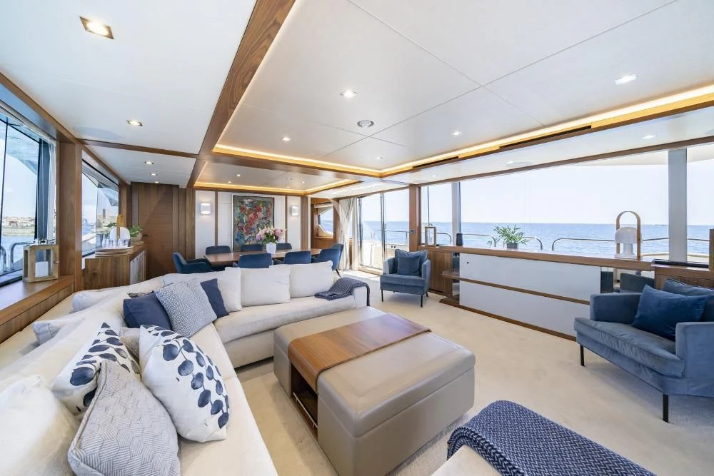 a living room with a large window aboard TAKE OFF Yacht for Sale