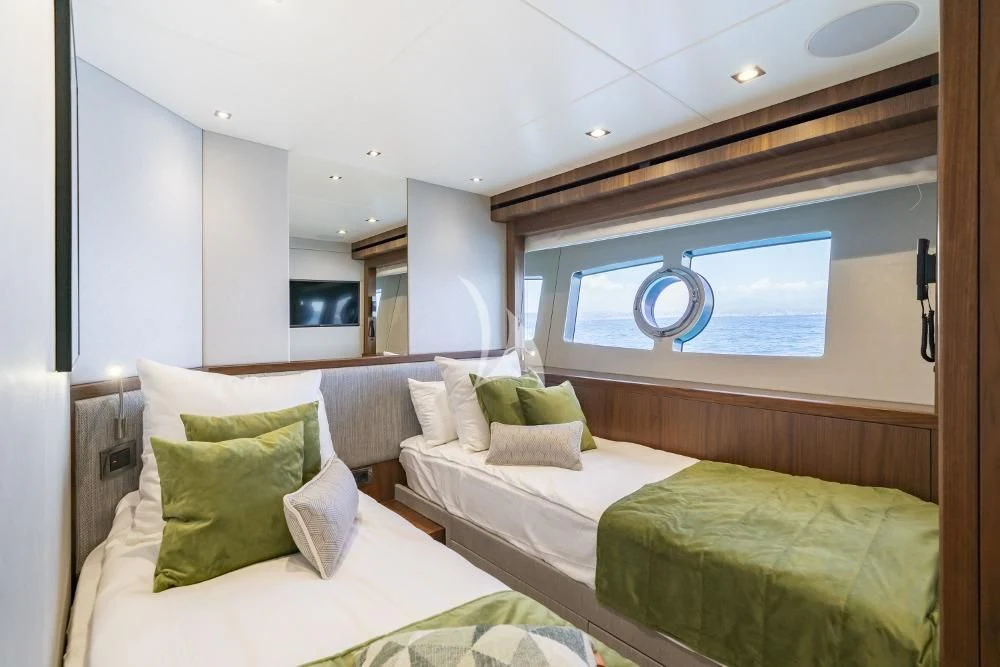 a room with two beds aboard TAKE OFF Yacht for Sale