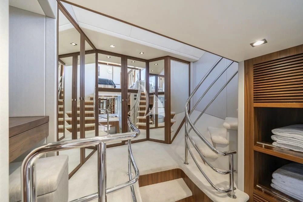 a room with a staircase and a glass door aboard TAKE OFF Yacht for Sale