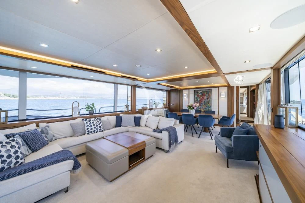 a living room with a large window aboard TAKE OFF Yacht for Sale