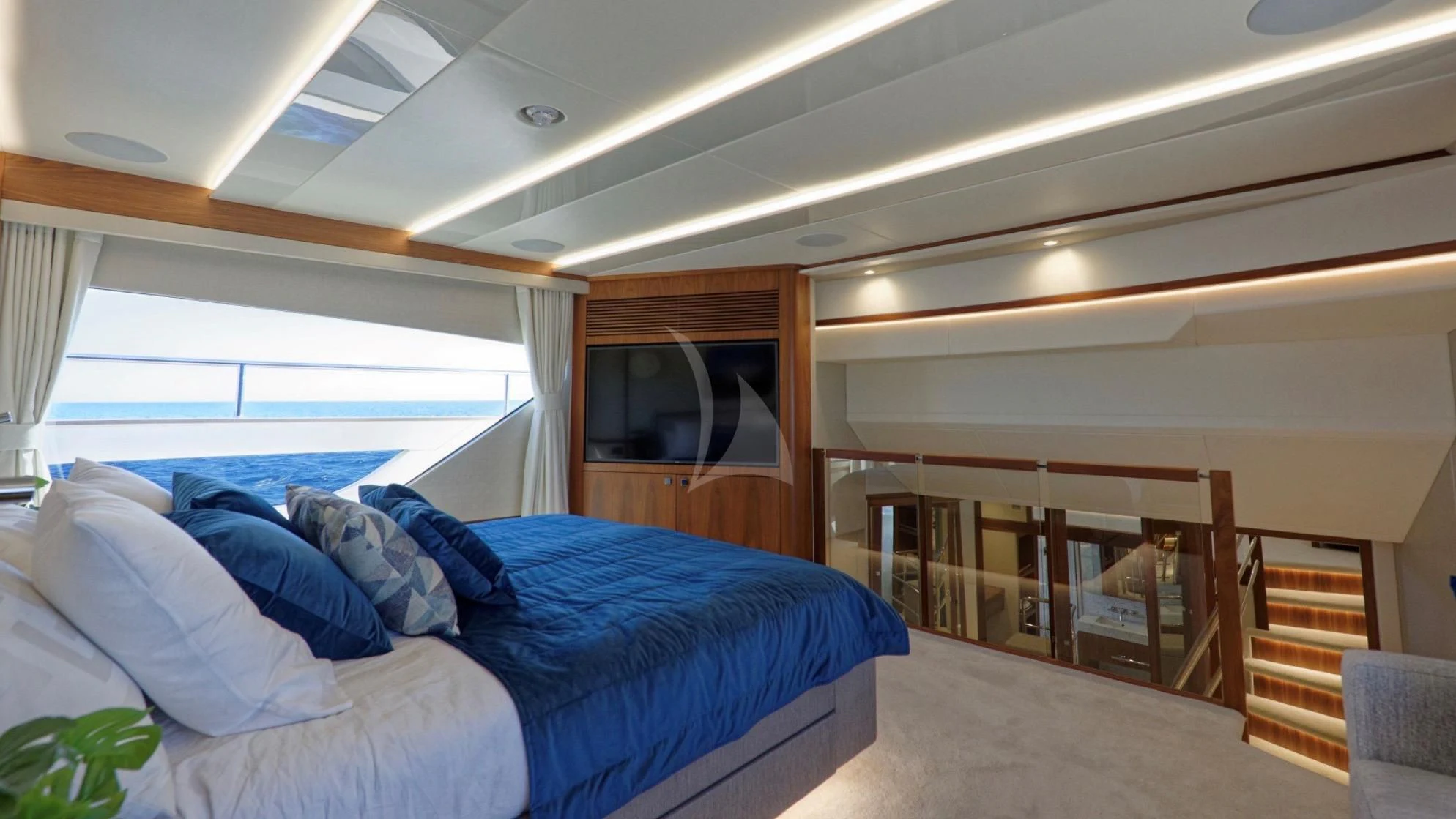 a room with a bed and a television aboard TAKE OFF Yacht for Sale