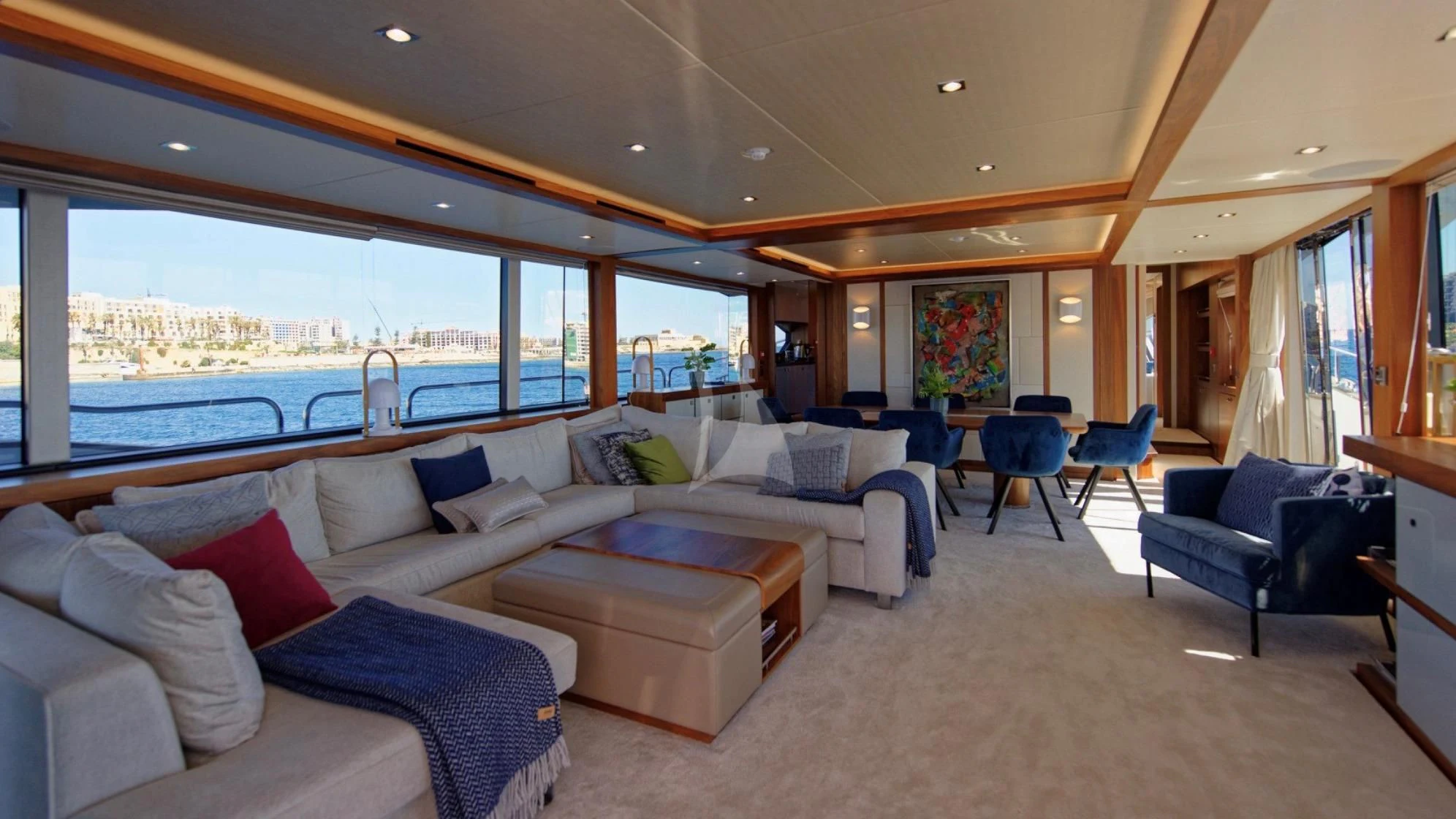 a living room with a large window aboard TAKE OFF Yacht for Sale