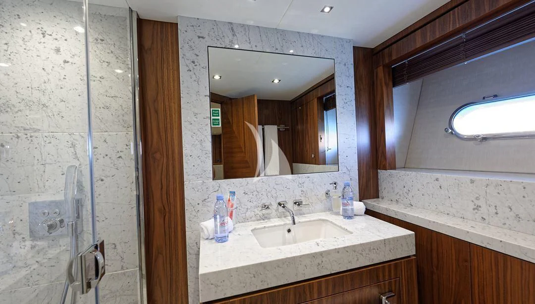 a bathroom with a large mirror aboard TAKE OFF Yacht for Sale