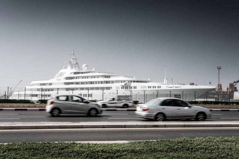 cars parked in front of a cruise ship aboard SCENIC ECLIPSE Yacht for Sale