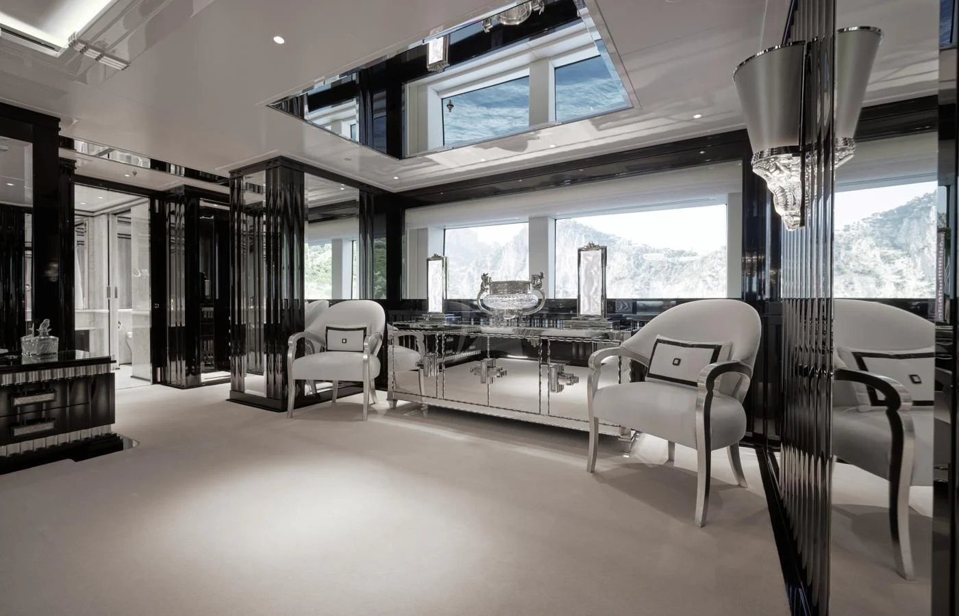 a room with tables and chairs aboard SILVER ANGEL Yacht for Charter