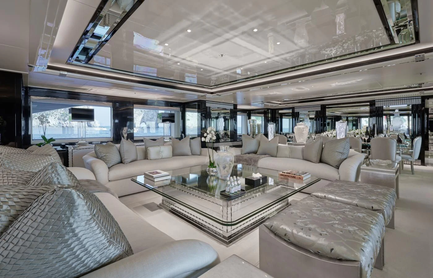 a living room with a large window aboard SILVER ANGEL Yacht for Charter