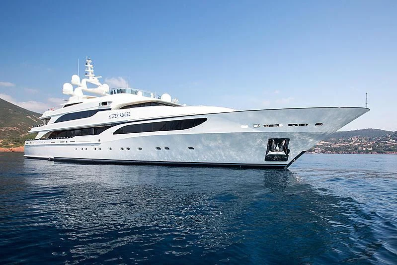 a white yacht in the water aboard SILVER ANGEL Yacht for Charter