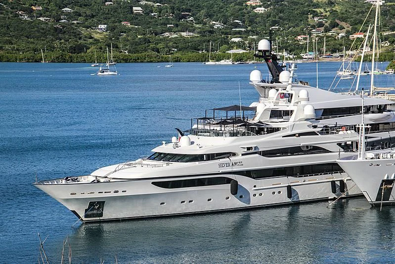 a white yacht in the water aboard SILVER ANGEL Yacht for Charter