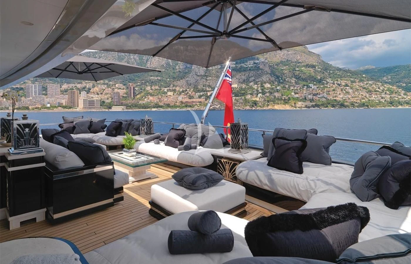 a room with a large patio and a large body of water aboard SILVER ANGEL Yacht for Charter