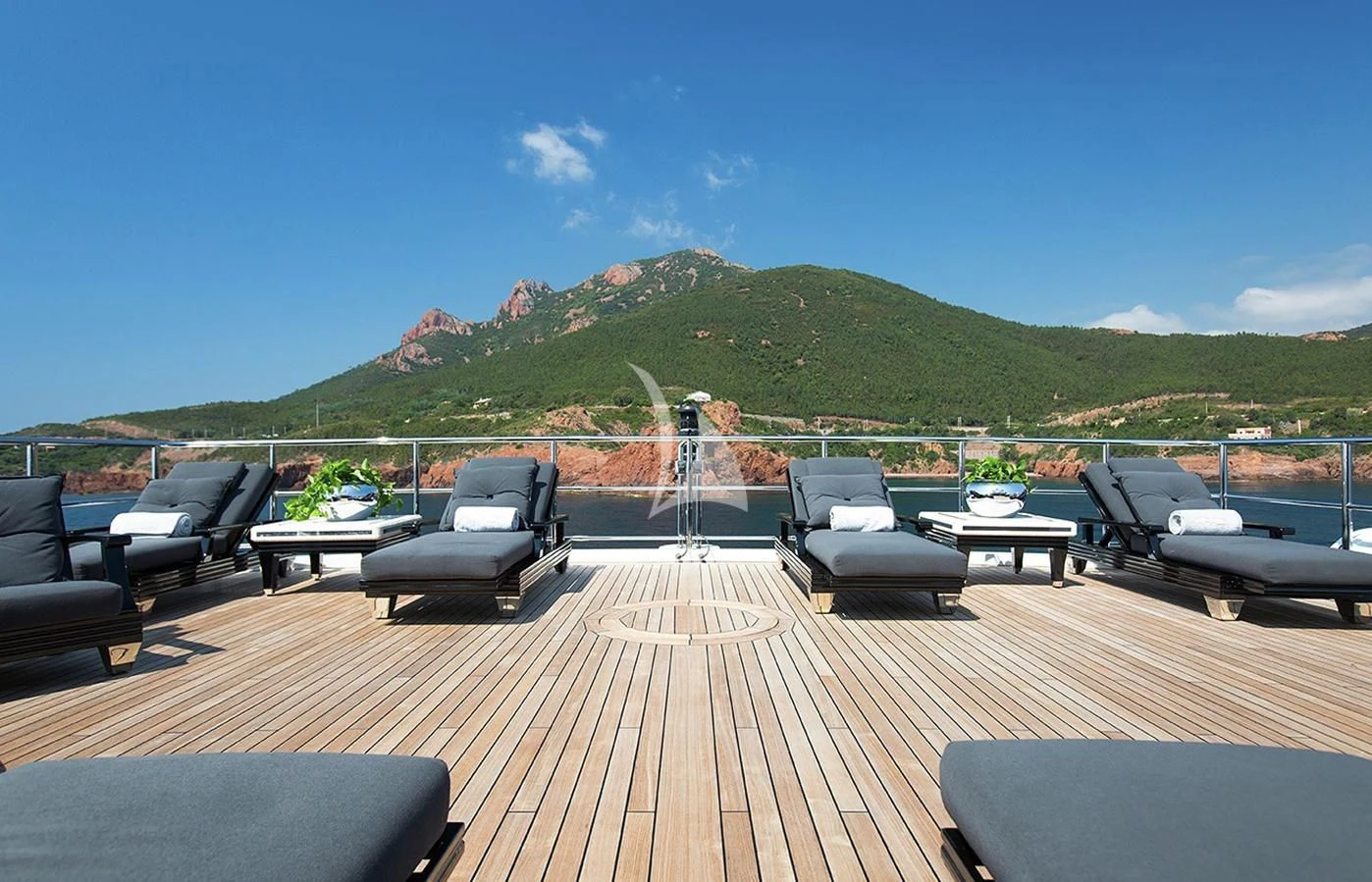 a deck overlooking a large body of water aboard SILVER ANGEL Yacht for Charter