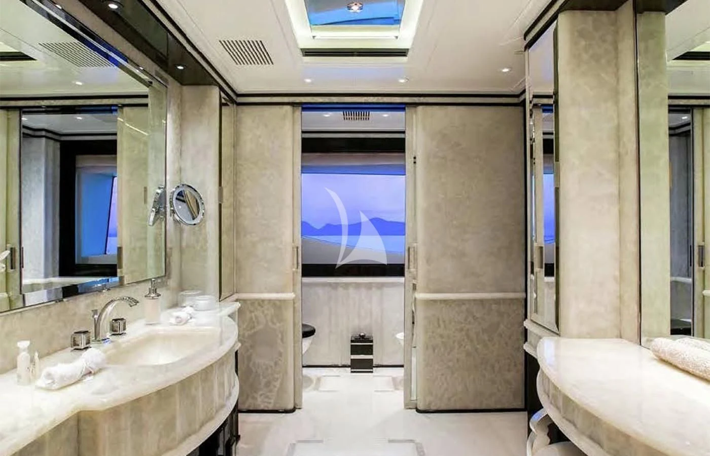 a bathroom with a large mirror aboard SILVER ANGEL Yacht for Charter
