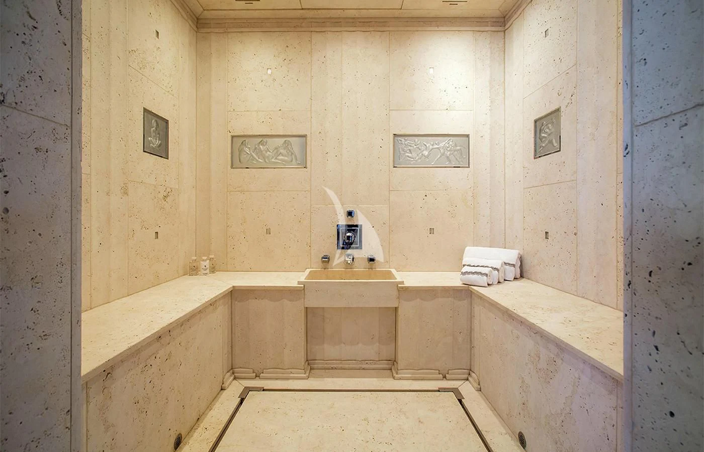 a bathroom with a sink and a mirror aboard SILVER ANGEL Yacht for Charter