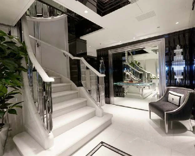 a modern looking staircase aboard SILVER ANGEL Yacht for Charter