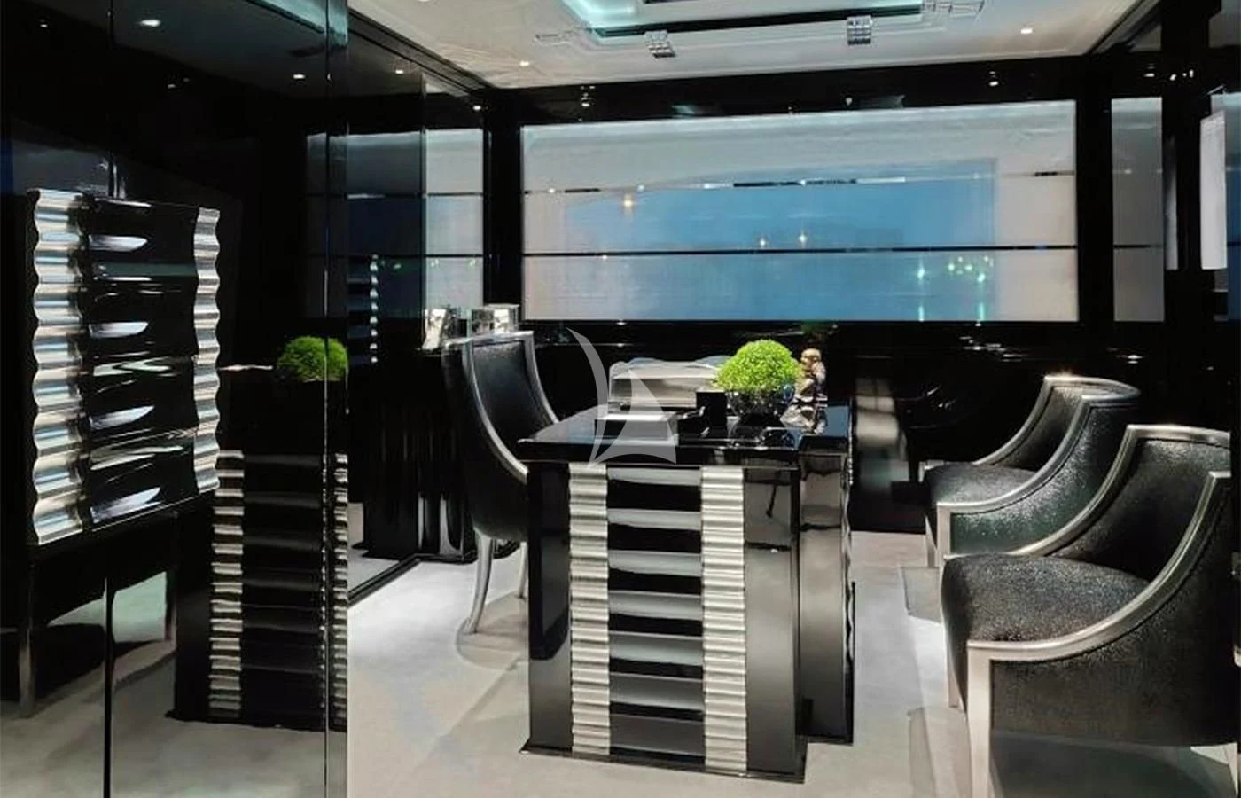 a room with a table and chairs aboard SILVER ANGEL Yacht for Charter