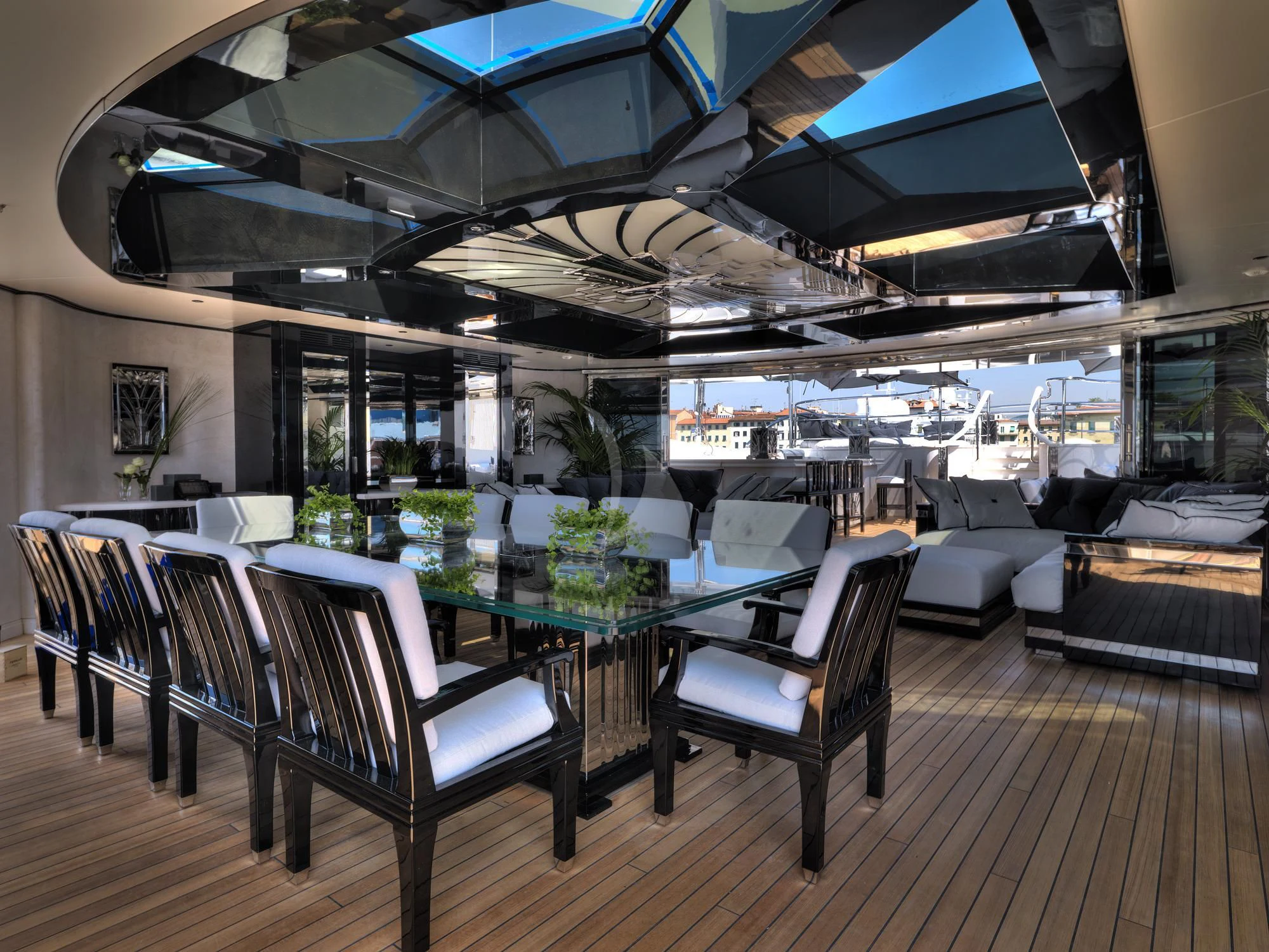 a room with a table chairs and a couch aboard SILVER ANGEL Yacht for Charter