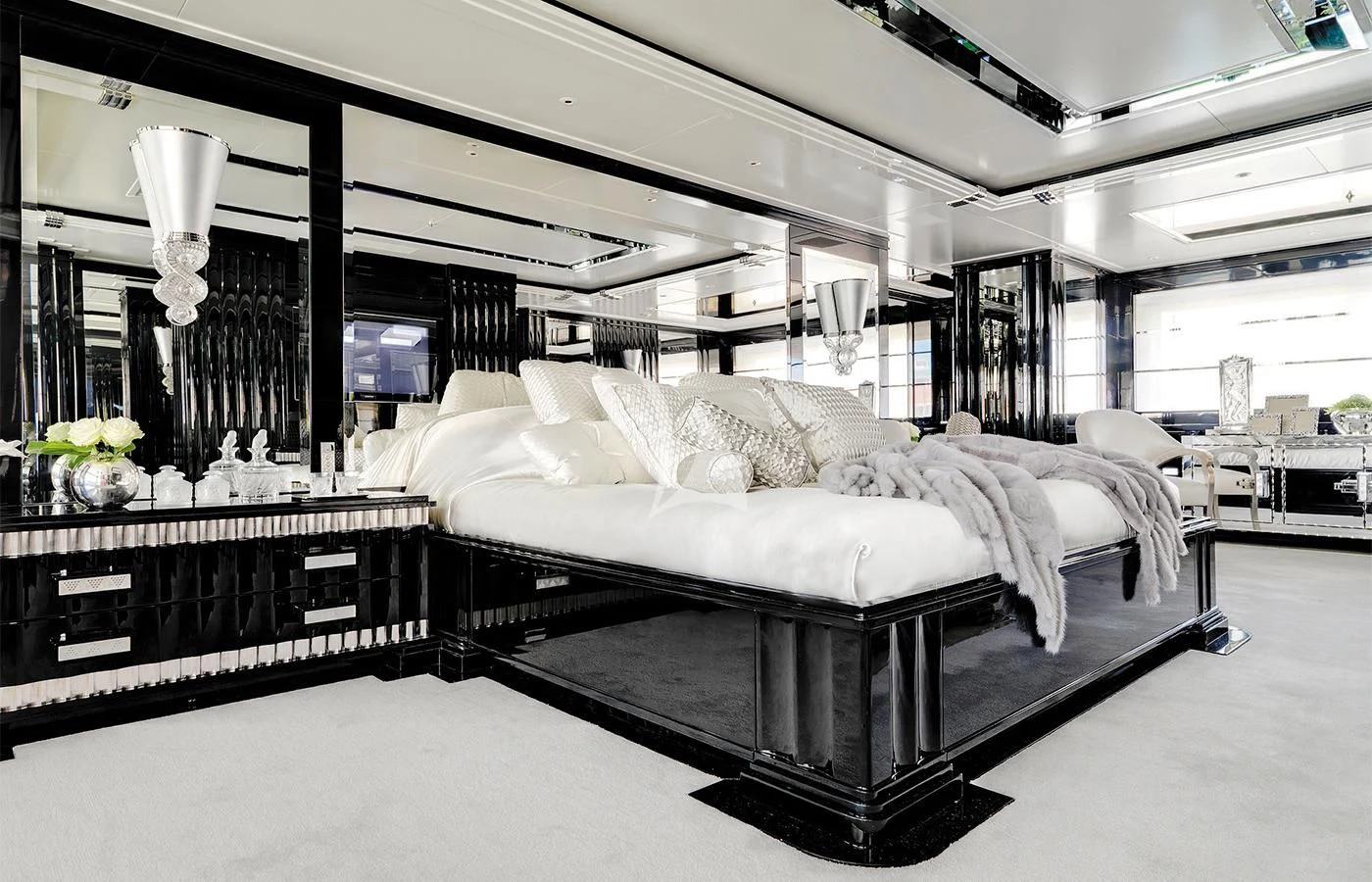 a large bedroom with a large bed aboard SILVER ANGEL Yacht for Charter