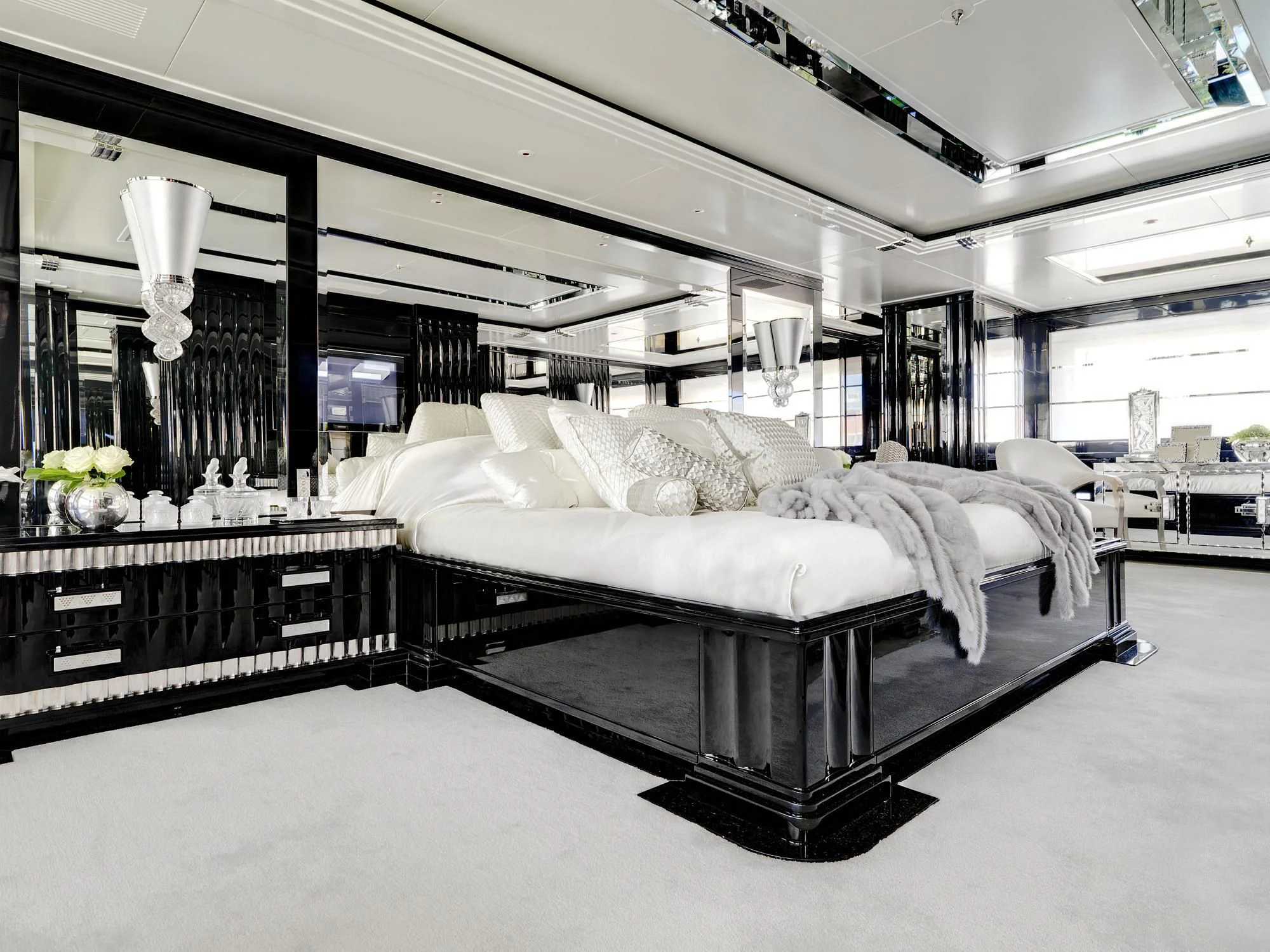 a large bedroom with a large bed aboard SILVER ANGEL Yacht for Charter