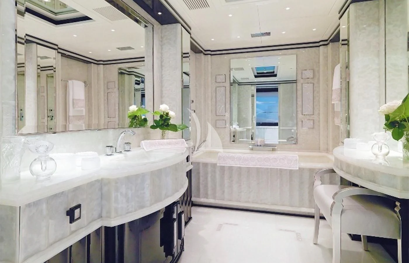 a bathroom with a large mirror aboard SILVER ANGEL Yacht for Charter