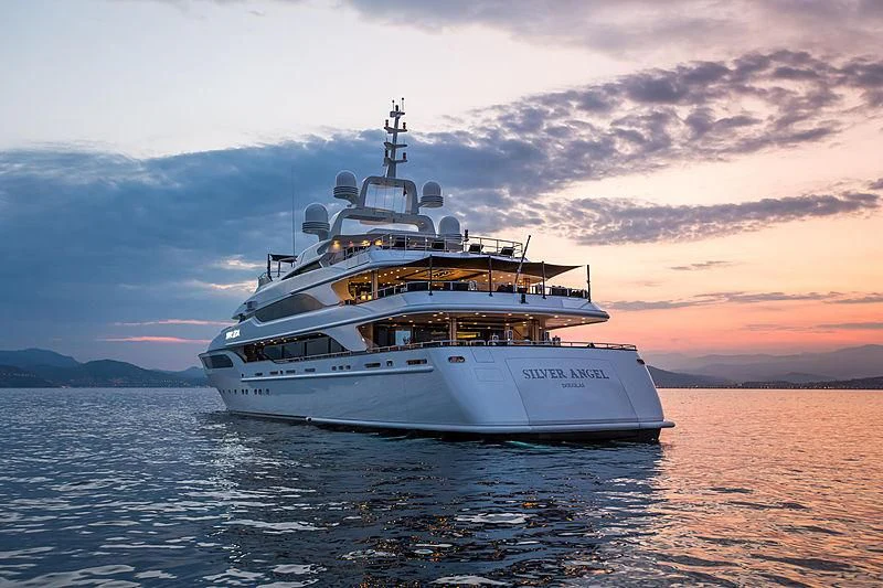 a large white boat in the water aboard SILVER ANGEL Yacht for Charter