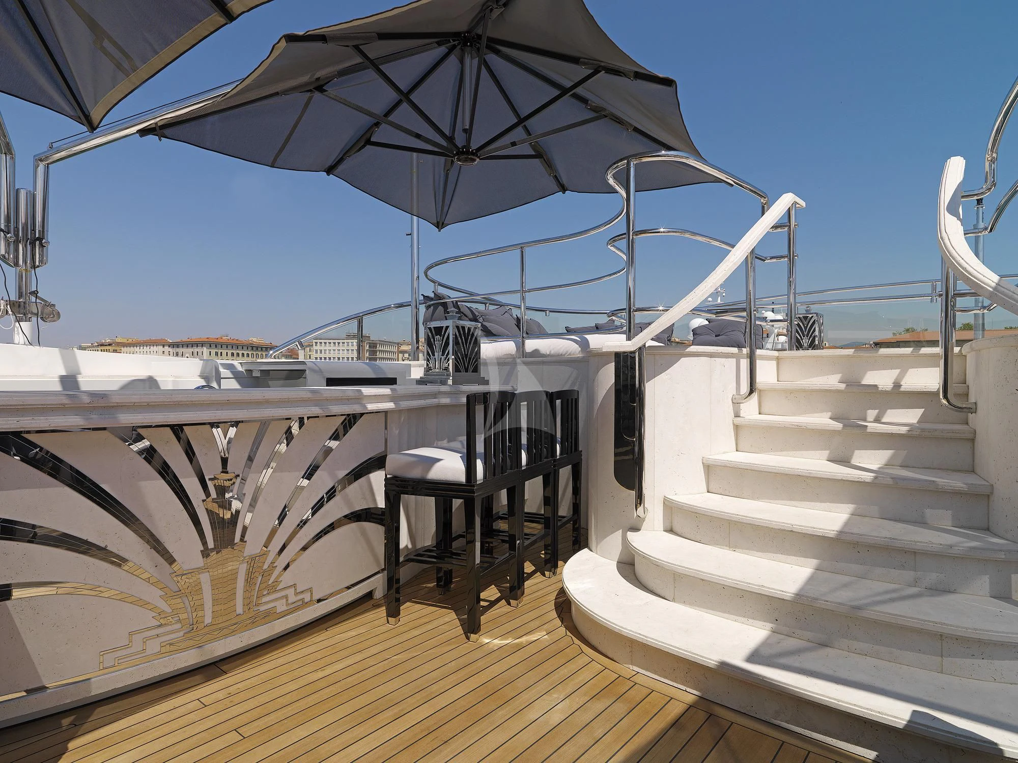 a deck with a large umbrella aboard SILVER ANGEL Yacht for Charter