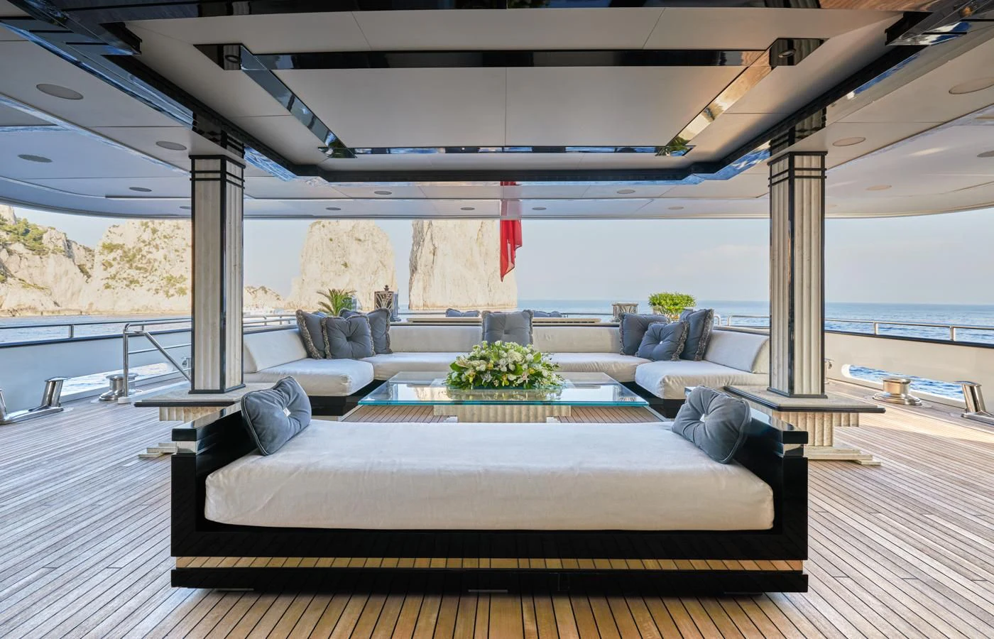 a large living room with a large window aboard SILVER ANGEL Yacht for Charter
