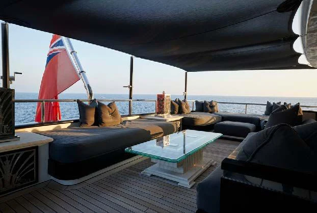 a living room with a large window aboard SILVER ANGEL Yacht for Charter