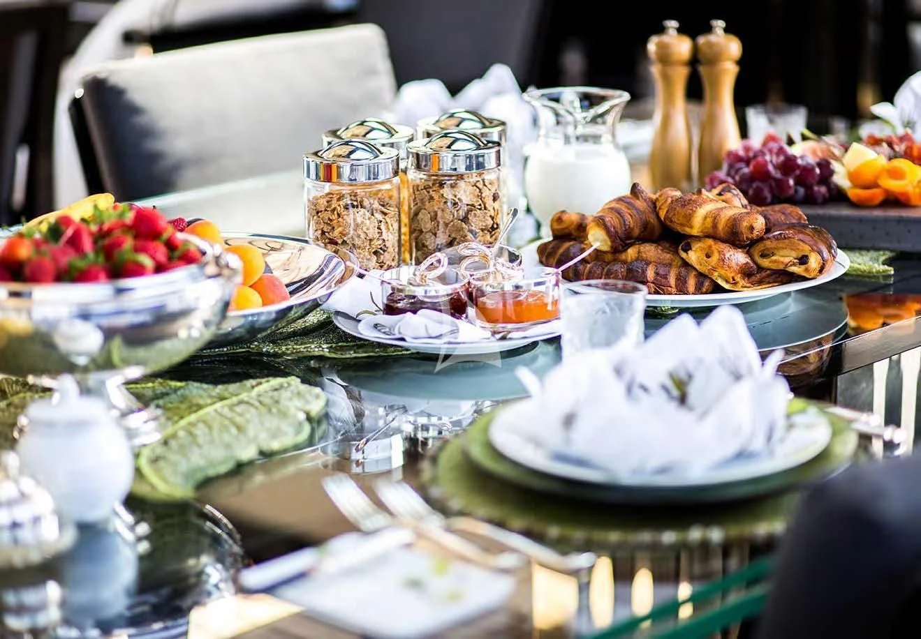 a table full of food aboard SILVER ANGEL Yacht for Charter