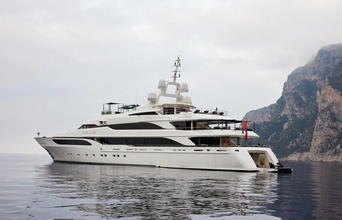 a white yacht in the water aboard SILVER ANGEL Yacht for Charter