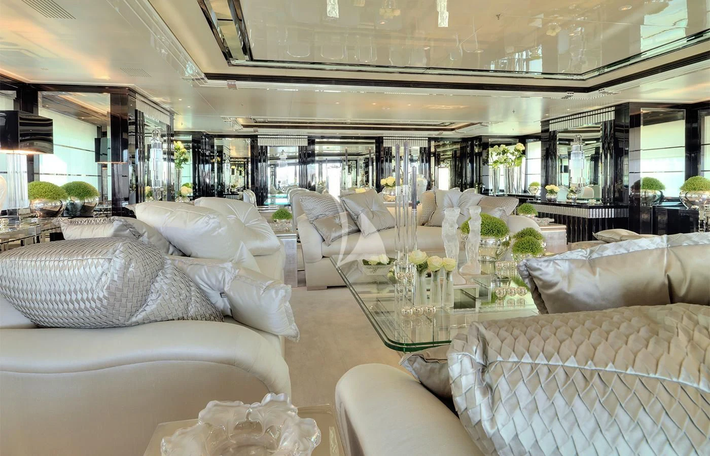 a room with couches and chairs aboard SILVER ANGEL Yacht for Charter