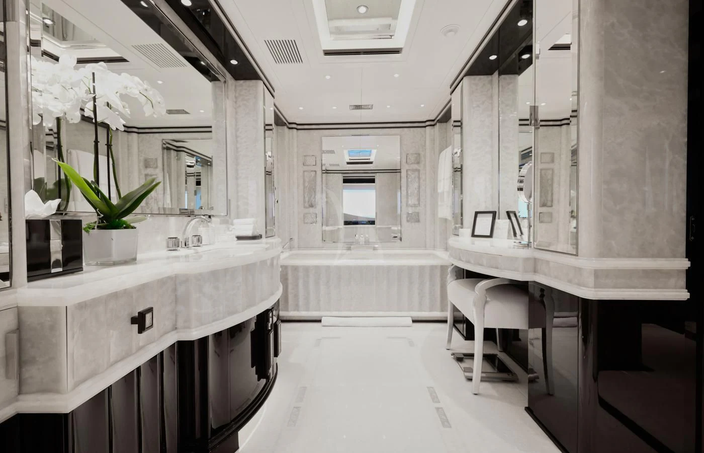 a room with white cabinets and white counter tops aboard SILVER ANGEL Yacht for Charter