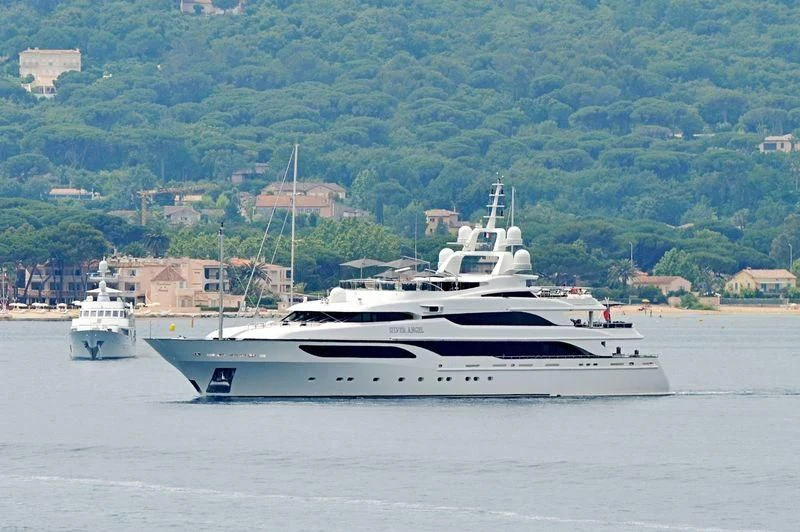 a couple of boats on a body of water aboard SILVER ANGEL Yacht for Charter