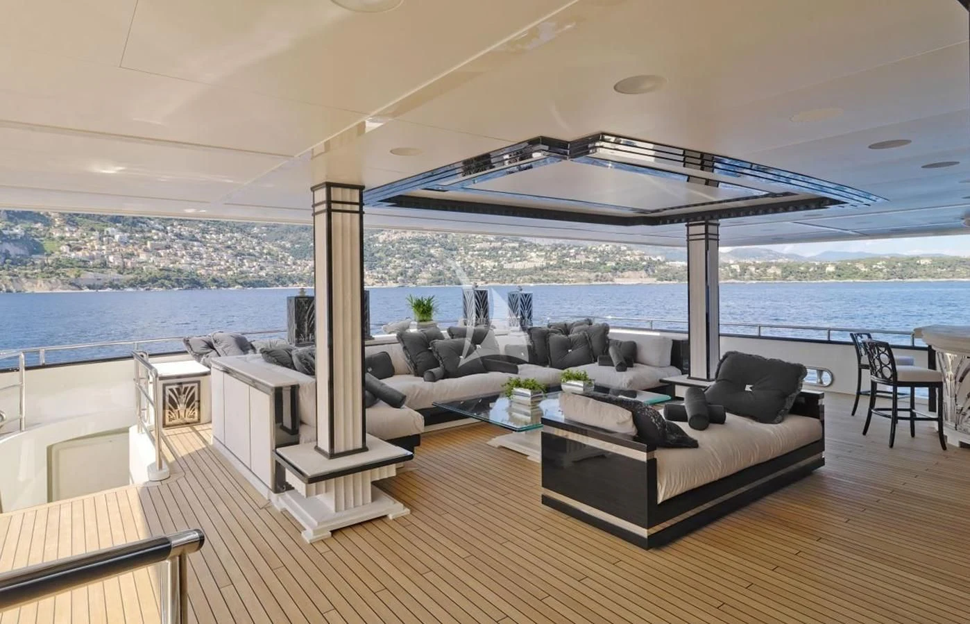 a living room with a large patio aboard SILVER ANGEL Yacht for Charter