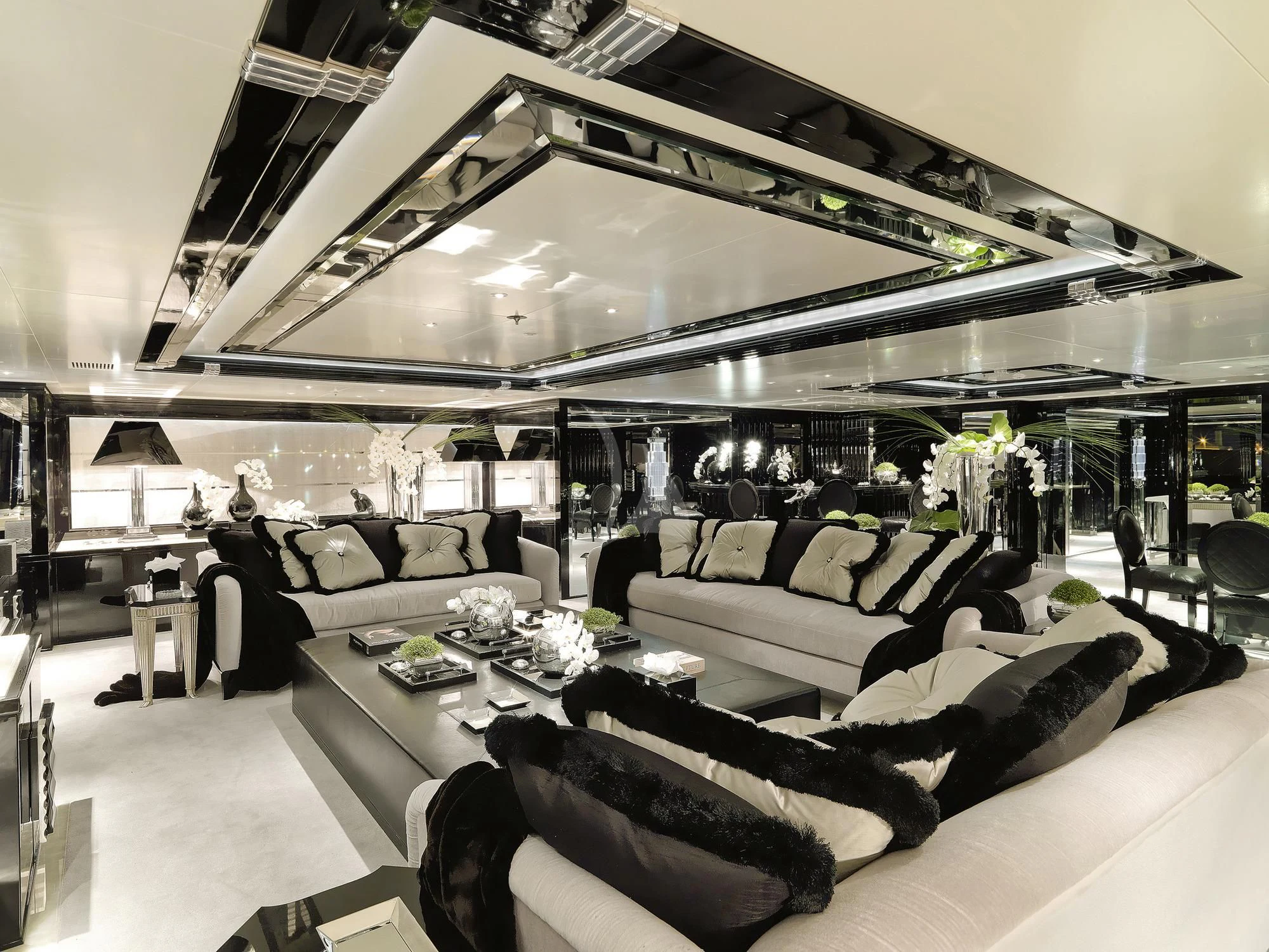 a person sitting in a living room aboard SILVER ANGEL Yacht for Charter