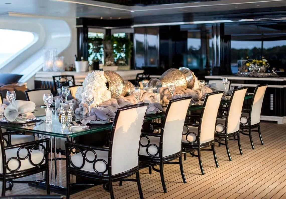 a table set for a dinner aboard SILVER ANGEL Yacht for Charter