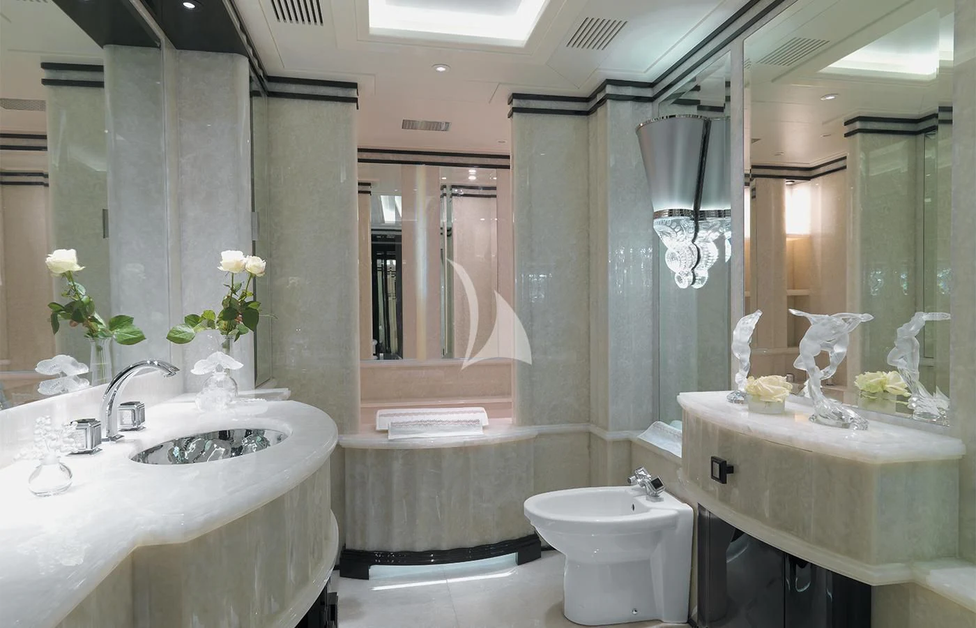 a bathroom with a sink and a toilet aboard SILVER ANGEL Yacht for Charter