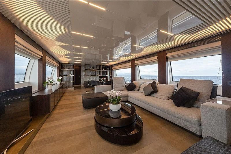a living room with a couch and a coffee table aboard GIO 2 Yacht for Sale