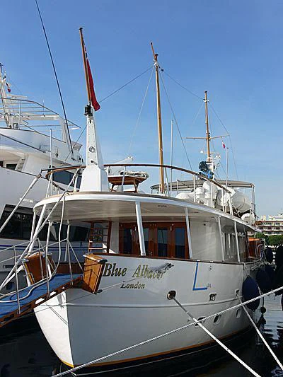 a boat docked at a pier aboard BLUE ALBACOR Yacht for Sale