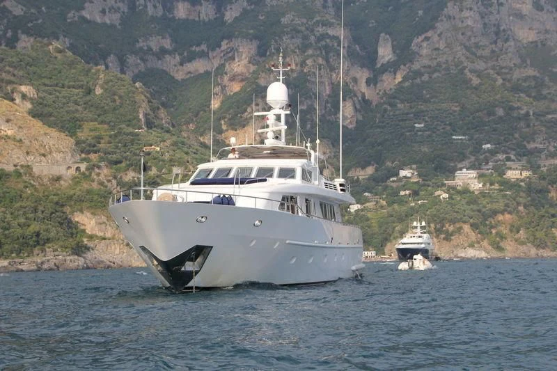 a boat sailing on the water aboard AMNA Yacht for Sale