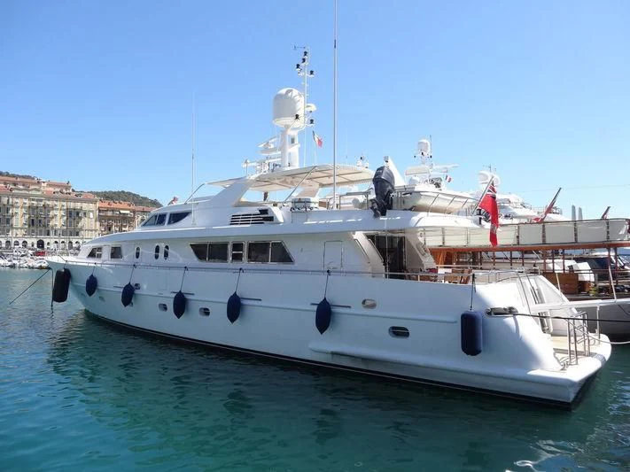a large white boat in the water aboard AMNA Yacht for Sale