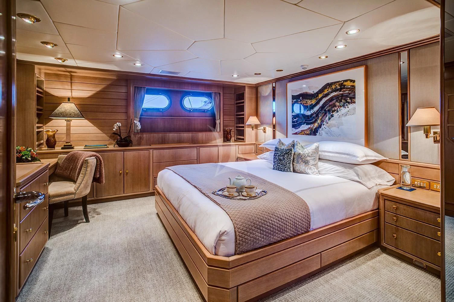 a bedroom with a large bed aboard CHANTAL MA VIE Yacht for Sale