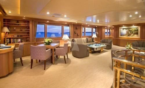 a living room with a large window aboard CHANTAL MA VIE Yacht for Sale