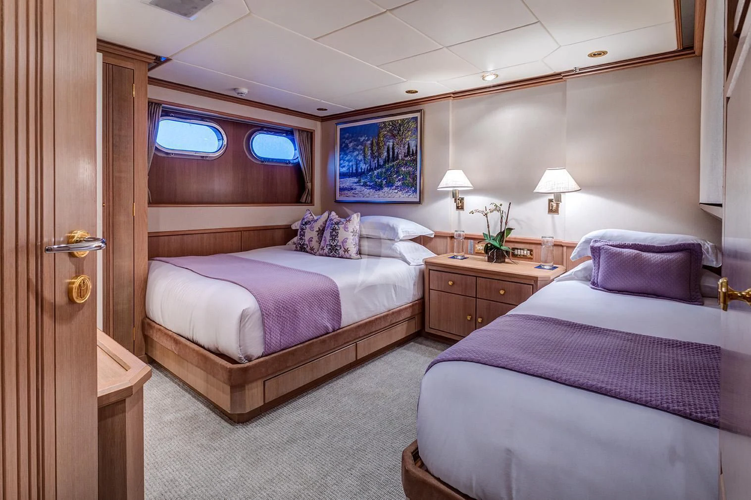 a couple of beds in a hotel room aboard CHANTAL MA VIE Yacht for Sale