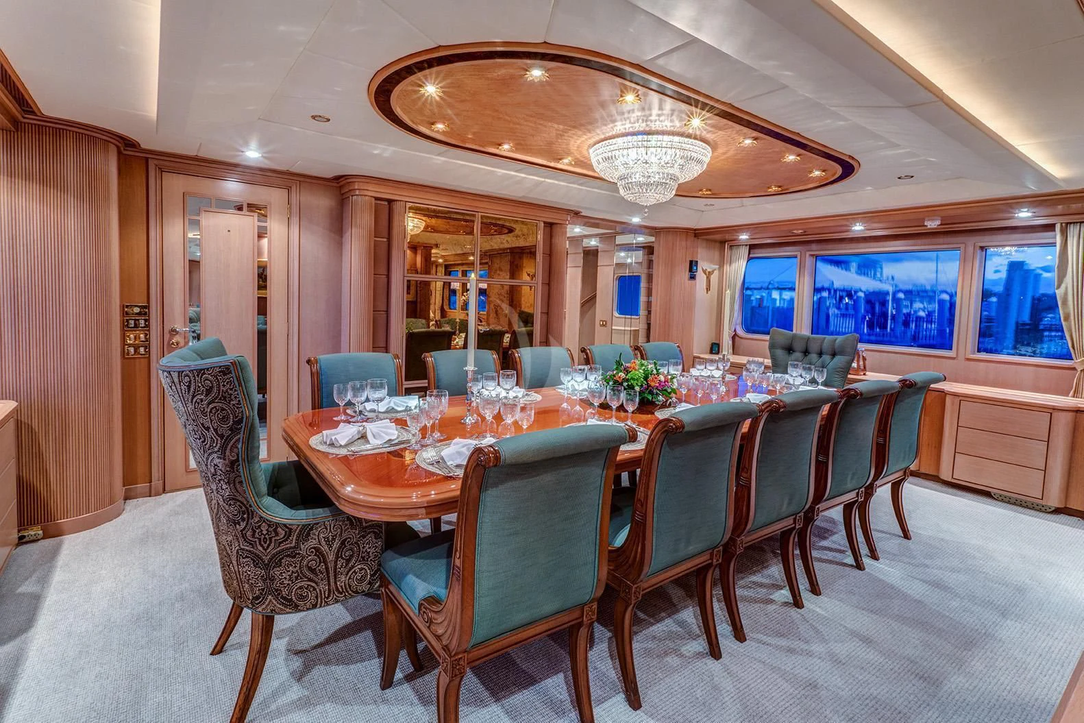 a dining room with a table and chairs aboard CHANTAL MA VIE Yacht for Sale