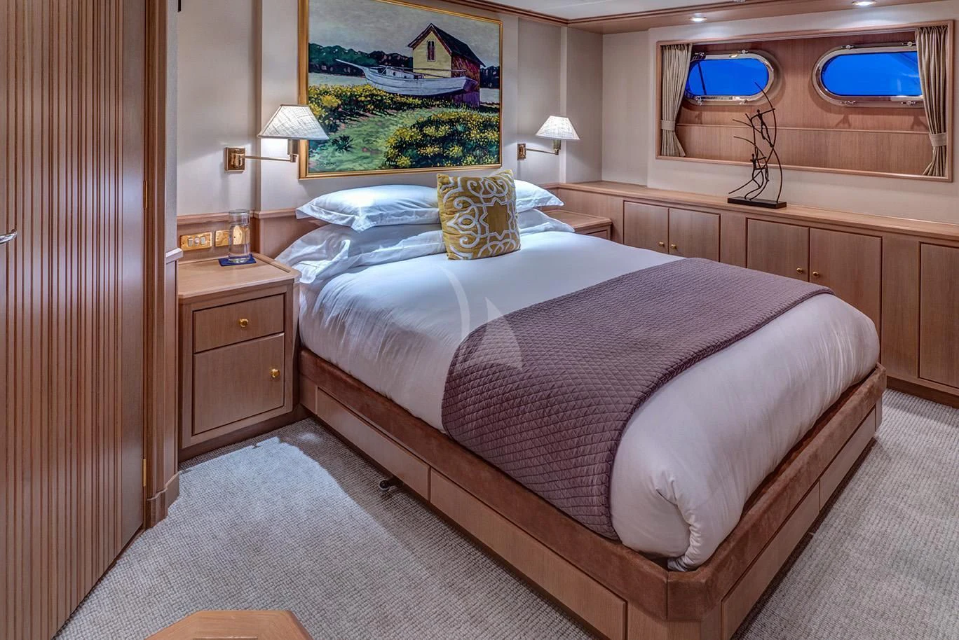 a bed with a white sheet aboard CHANTAL MA VIE Yacht for Sale